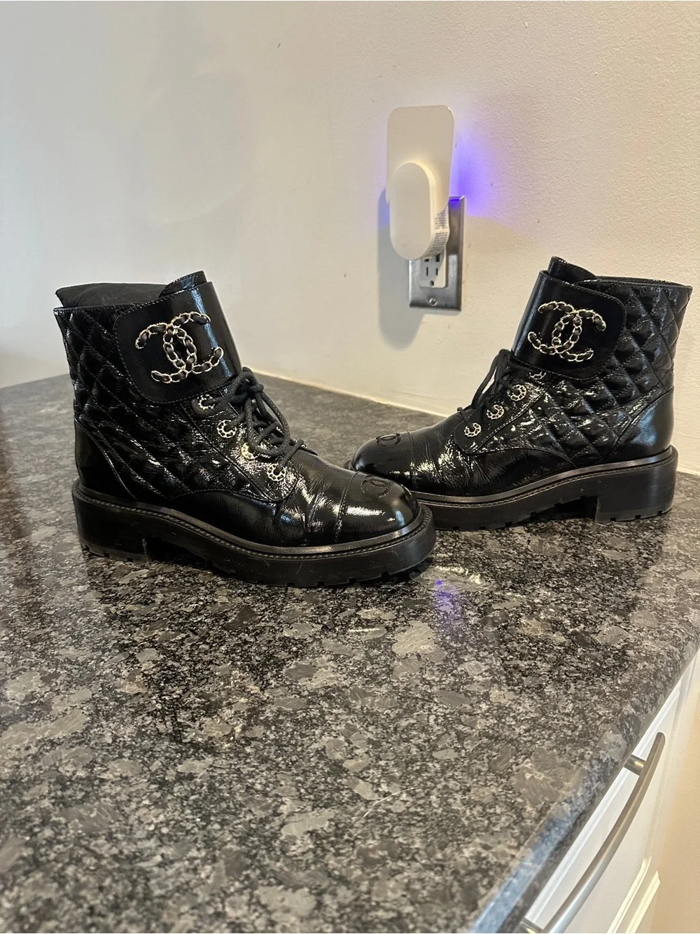CHANEL Black Patent Leather Quilted Lace-Up Combat Boots with Gold Hardware